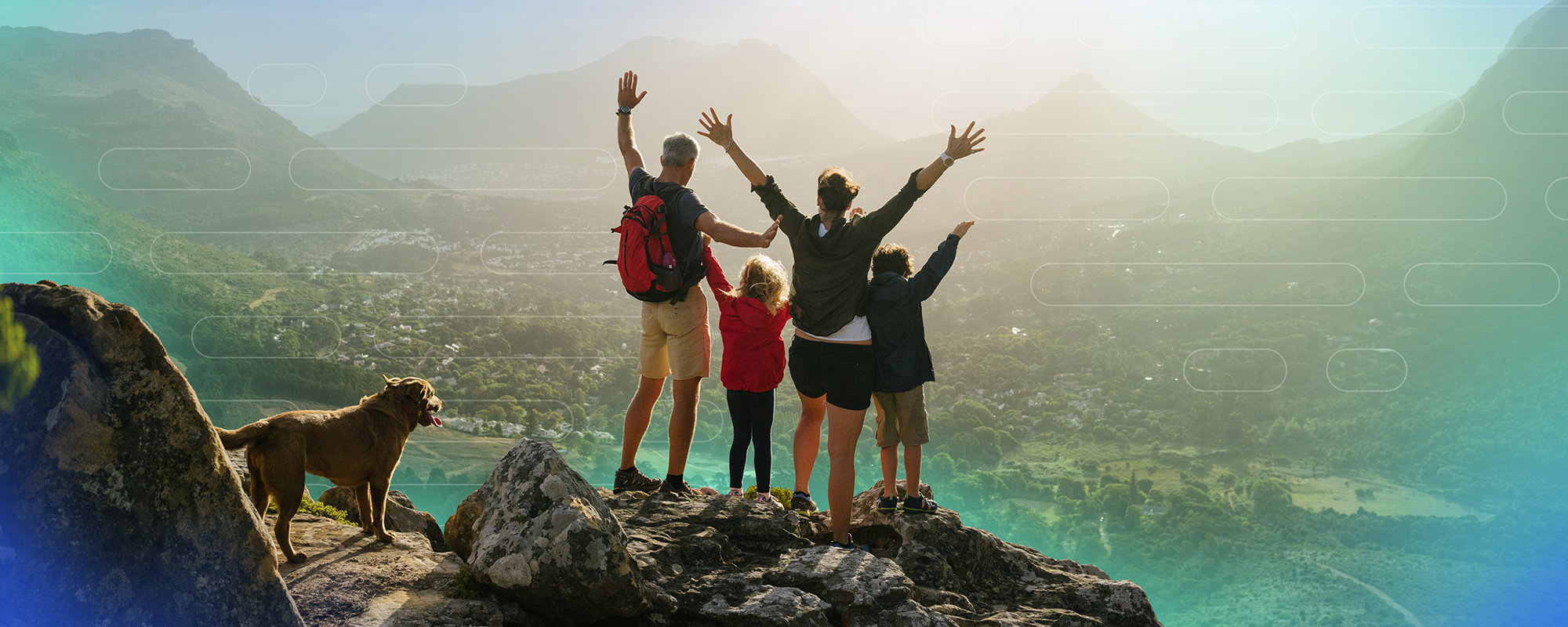 EMC-116A3-AnytimeLoans-D_Hero Family standing at the top of a mountain overlooking valley