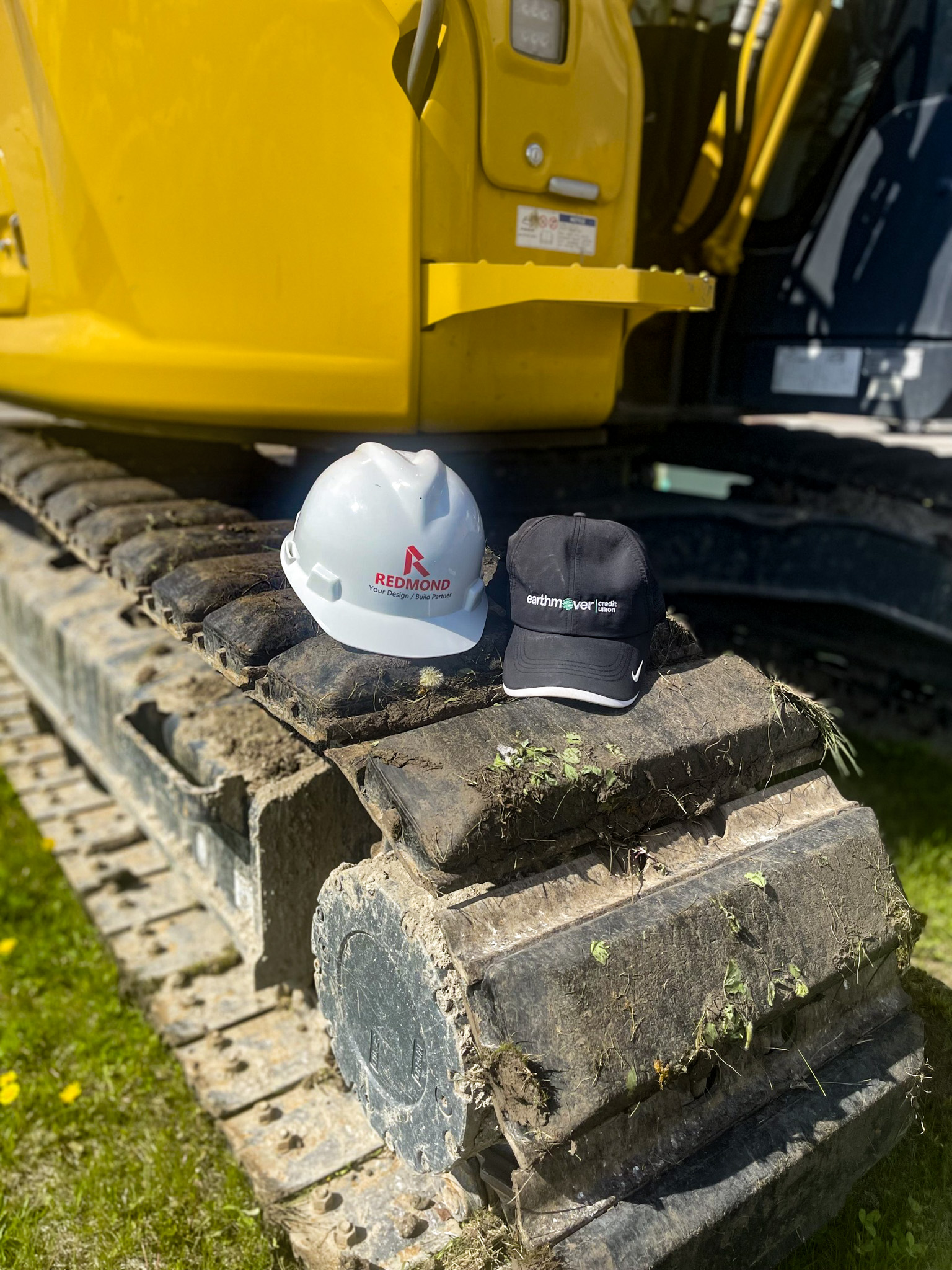 Construction helmets on bulldozer