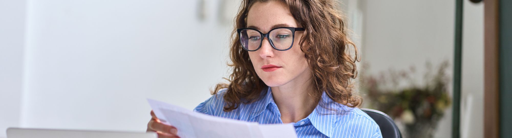 Woman looking at paper